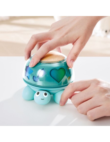 Tortuga musical Hape Twist & Tune 0M+ | Juguete sensorial bebé